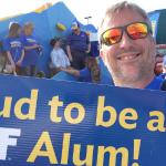 In the Frontier Parade with the university's float. University of Alaska was celebrating its 100th year.  I was class of '83.