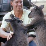 Hitchhiker with kangaroos on Kangaroo Island. He swam miles in the ocean every morning