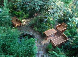 A view of my "garage bed," where a garage used to be. Now it's a quiet nook with a pond and small waterfall.