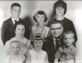 My family clockwise from lower left: Payton, Kathleen (Mom), Steve, Wendy, Nancy, Greg, Warren (Dad), Ann