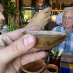 Toasting with a chocolate drink at the Botanical Garden.